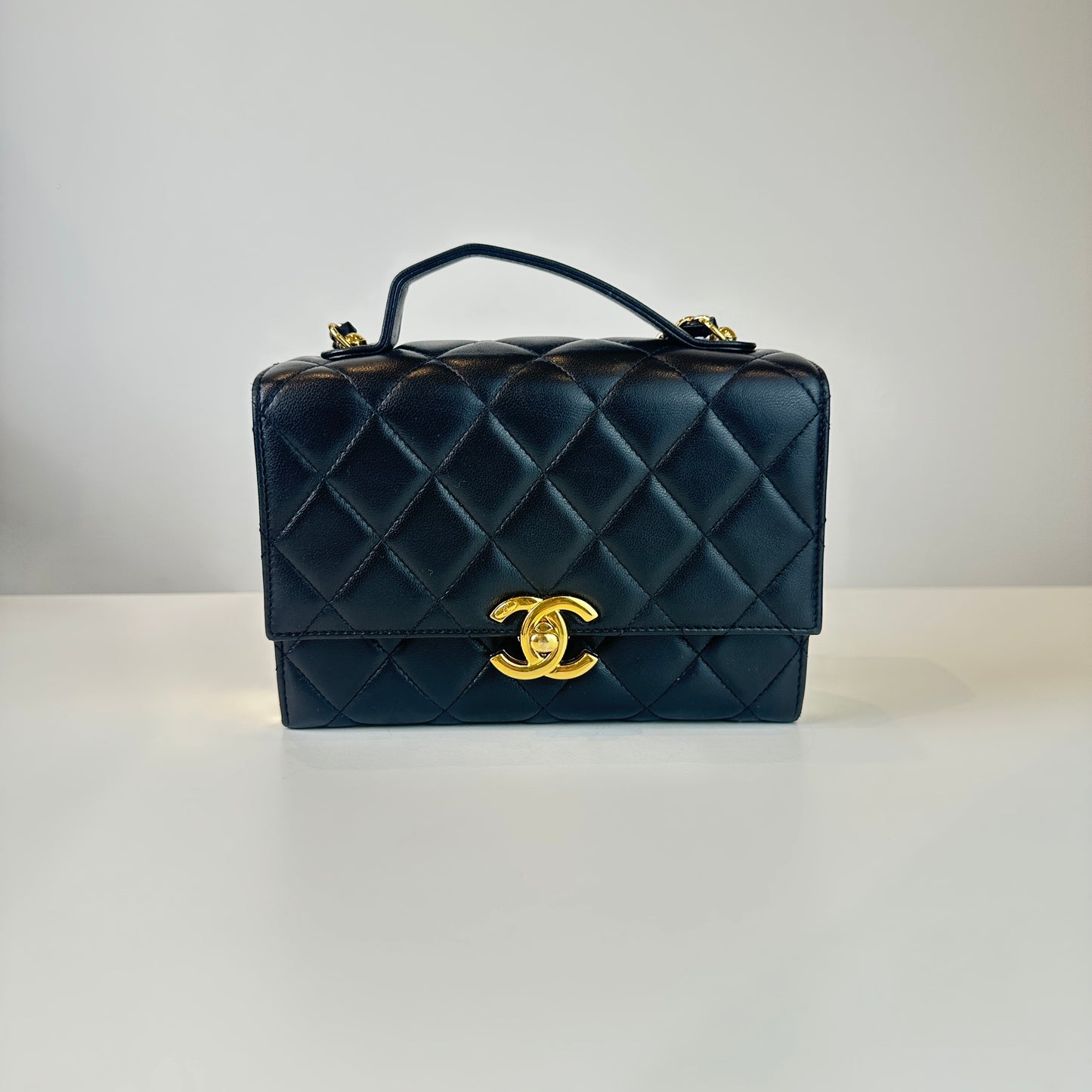 Chanel 21K Black Lambskin Gold CC Case