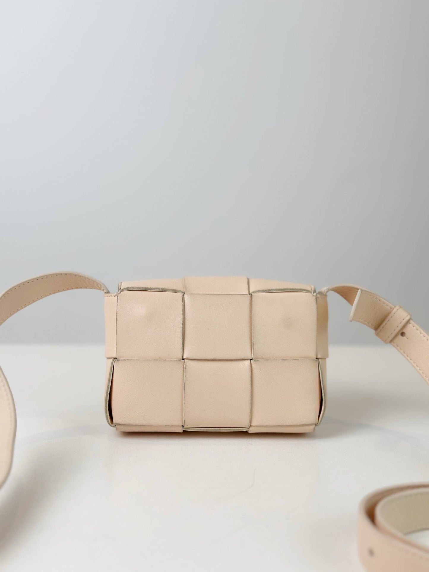 BOTTEGA VENETA CANDY CASSETTE MINI LIGHT PINK CROSSBODY BAG
