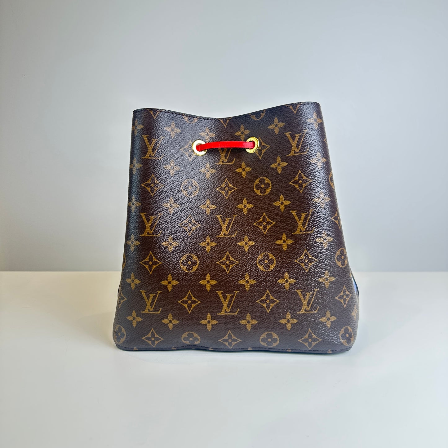 LV Monogram & red bucket