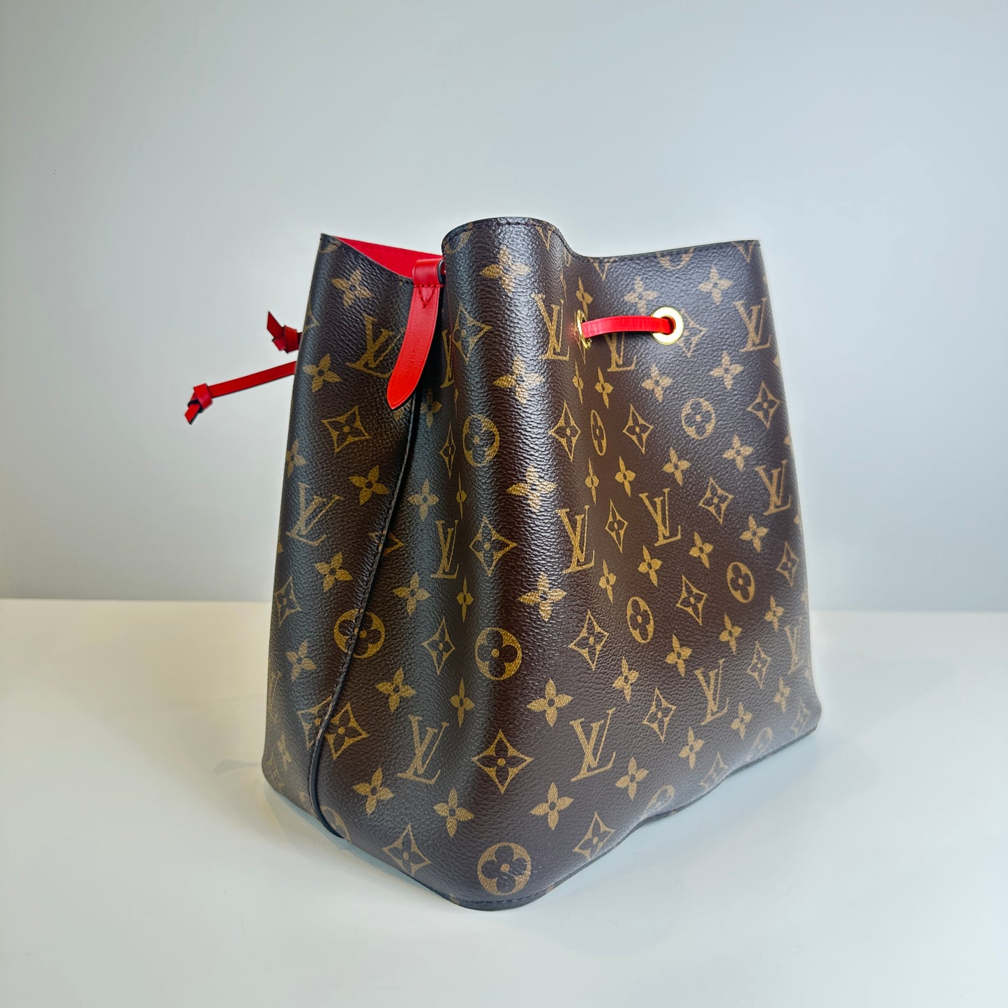 LV Monogram & red bucket