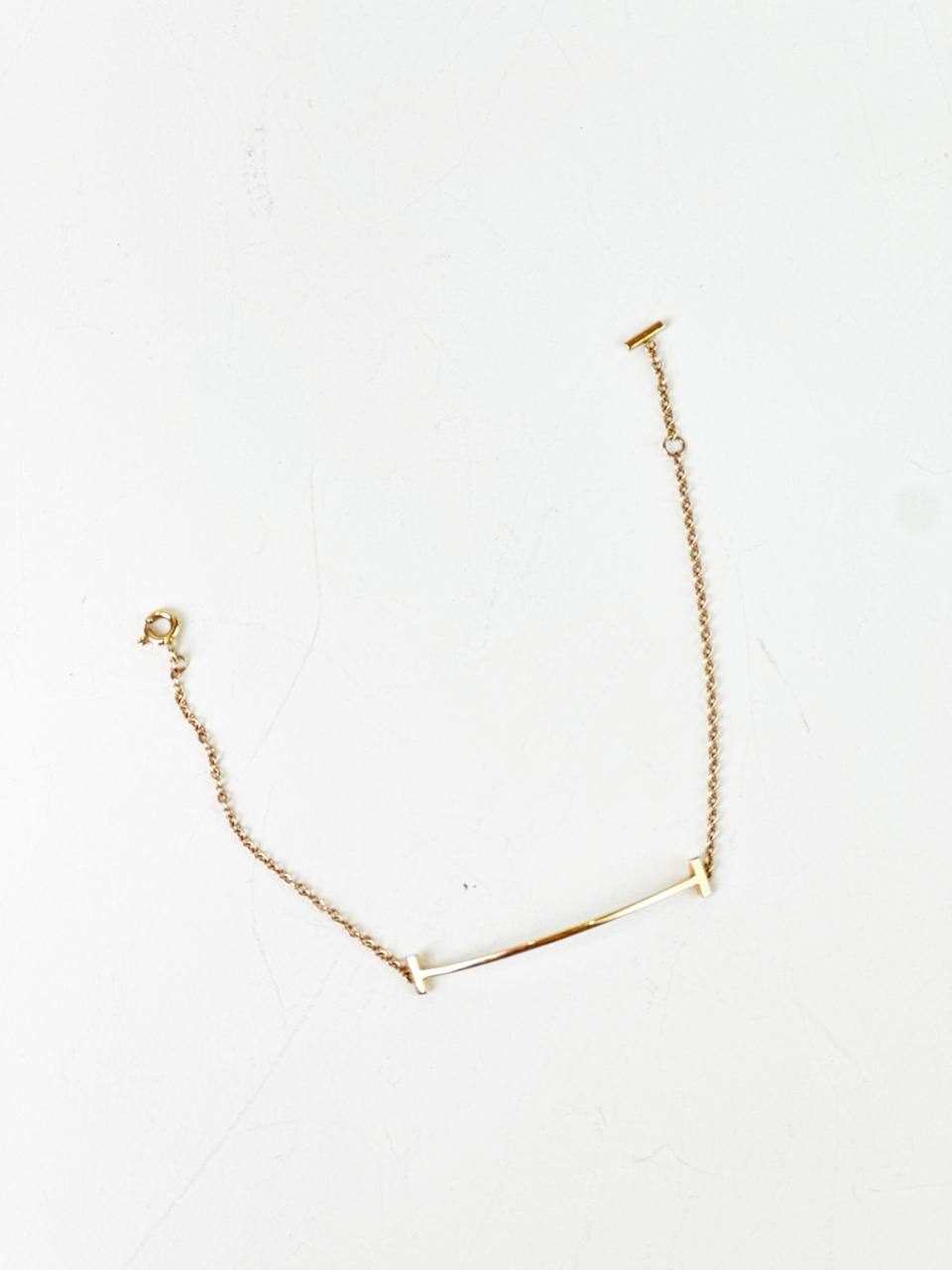 TIFFANY & CO. T SMILE IN YELLOW GOLD BRACELET