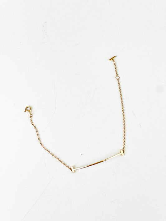 TIFFANY & CO. T SMILE IN YELLOW GOLD BRACELET