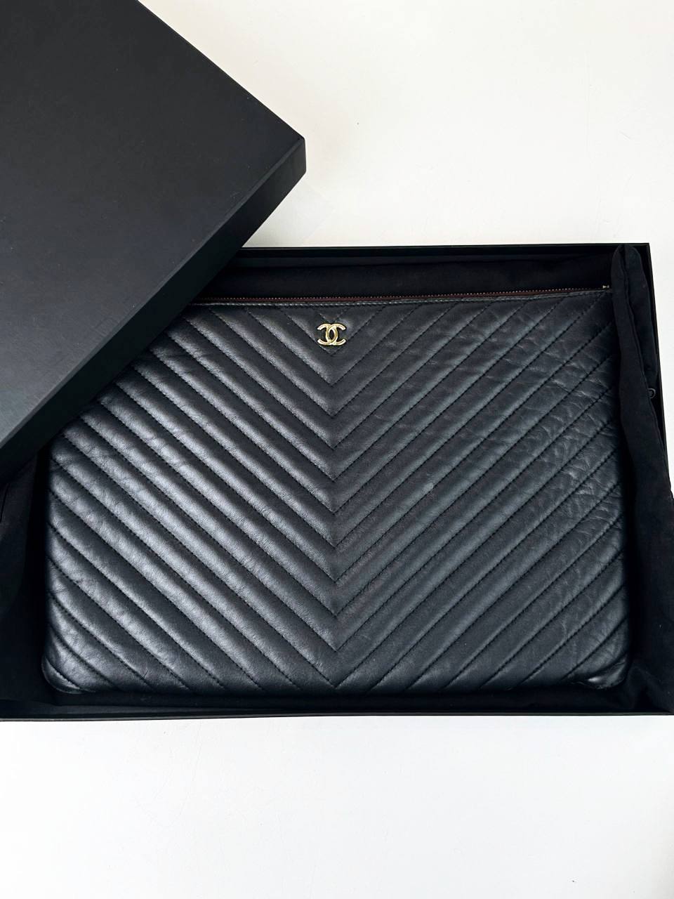 CHANEL BLACK CHEVRON O CASE CLUTCH GHW