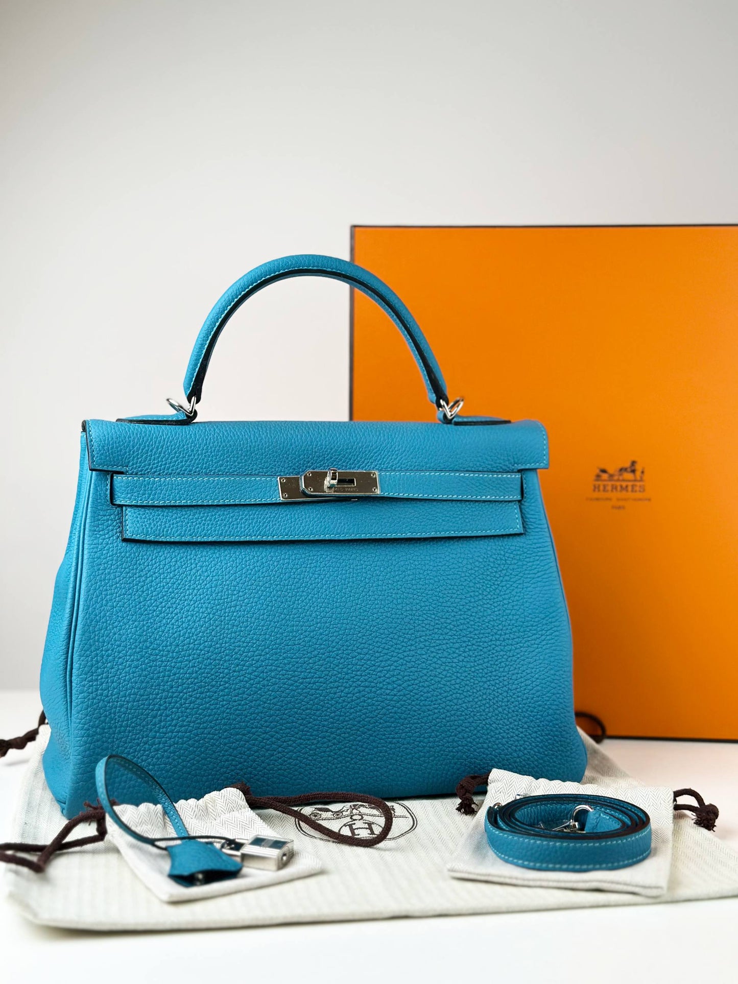 HERMES KELLY 32 BLUE JEAN CLEMENCE LEATHER HANDBAG PHW