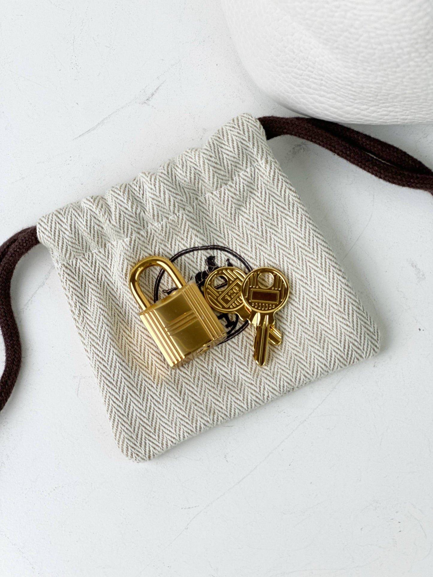 HERMES PICOTIN LOCK 18 IN WHITE TAURILLION CLEMENCE LEATHER GHW